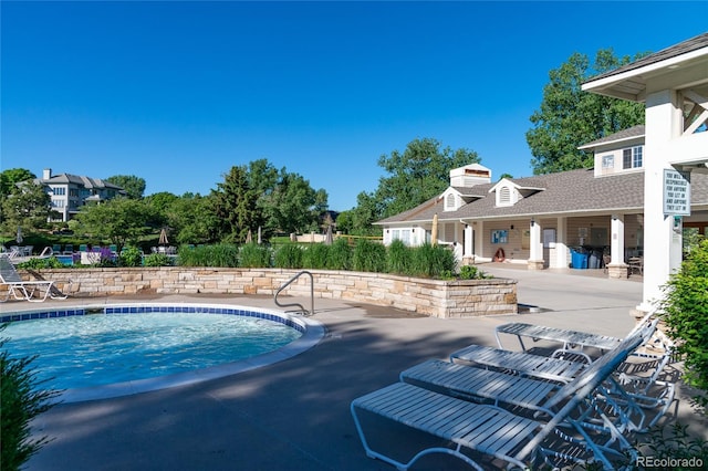 view of pool with a patio area