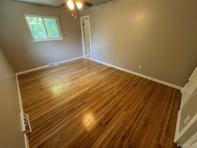6085 Simms St, Arvada, CO 80004 - spare room featuring wood finished floors and ceiling fan