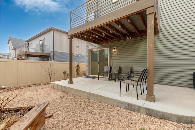 view of patio with fence
