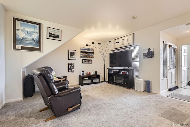 living room featuring light carpet