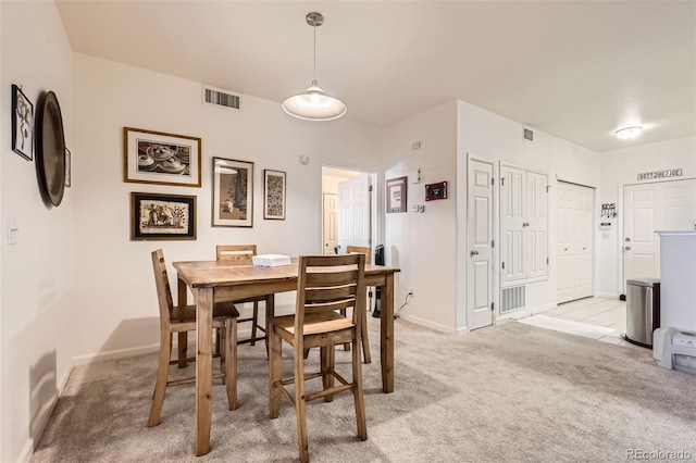 view of carpeted dining room