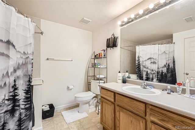 bathroom with a shower with curtain, vanity, and toilet