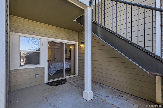 property entrance with a patio