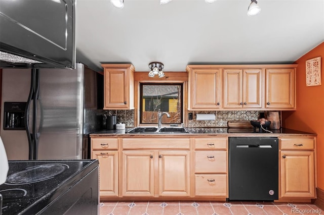 kitchen featuring sink, decorative backsplash, light brown cabinetry, and black appliances