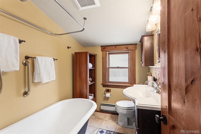 bathroom featuring vanity, a bathtub, a baseboard radiator, and toilet