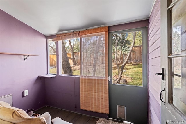 unfurnished sunroom with plenty of natural light