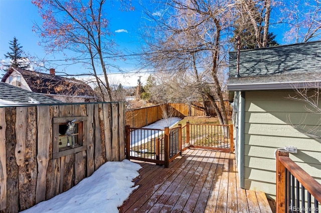 view of snow covered deck