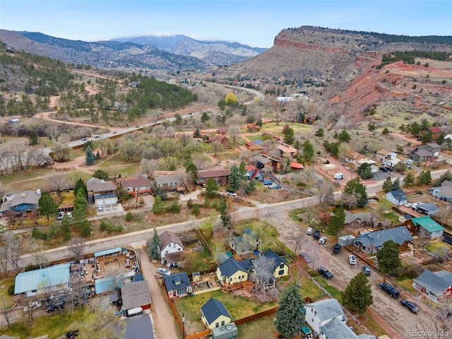 bird's eye view featuring a residential view and a mountain view