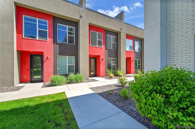 3044 Wilson Ct Unit 2, Denver, CO 80205 - view of front facade featuring stucco siding and brick siding