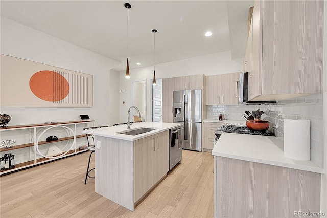 3044 Wilson Ct Unit 2, Denver, CO 80205 - kitchen with appliances with stainless steel finishes, a sink, modern cabinets, and light countertops