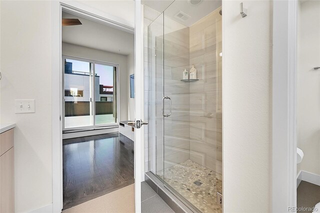 3044 Wilson Ct Unit 2, Denver, CO 80205 - full bathroom featuring a shower stall and vanity