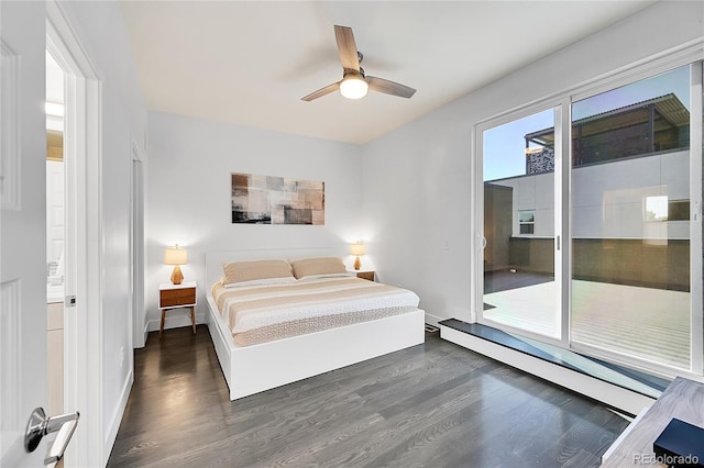 3044 Wilson Ct Unit 2, Denver, CO 80205 - bedroom featuring dark wood-style flooring, access to exterior, ceiling fan, and baseboard heating
