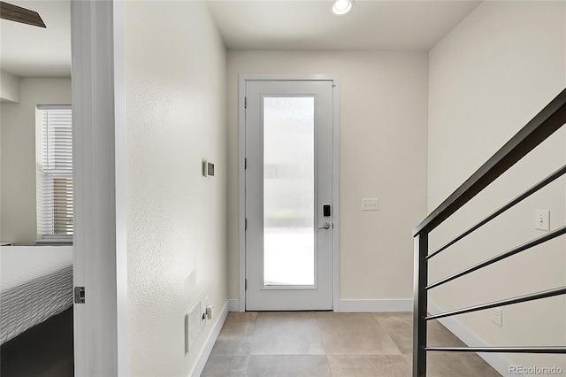 3044 Wilson Ct Unit 2, Denver, CO 80205 - entryway with baseboards, light tile patterned floors, and recessed lighting