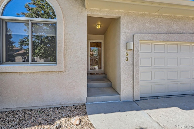 entrance to property with a garage