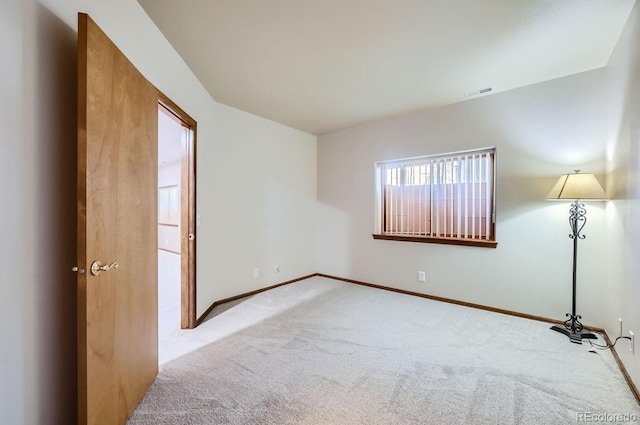 view of carpeted spare room