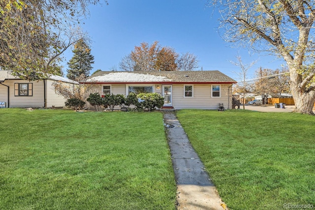 view of front facade with a front lawn