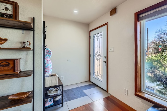 foyer with light hardwood / wood-style flooring