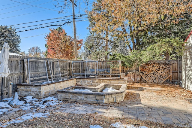 view of snow covered patio