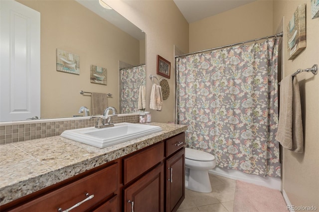 full bath featuring backsplash, toilet, tile patterned floors, and vanity