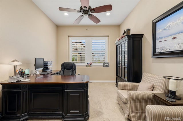 home office featuring a ceiling fan, baseboards, recessed lighting, and light carpet