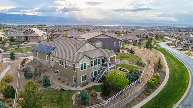 bird's eye view featuring a mountain view and a residential view
