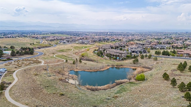 aerial view with a residential view and a water and mountain view