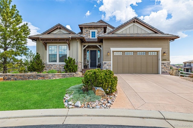 view of front of house featuring a garage, a front lawn, stone siding, board and batten siding, and concrete driveway