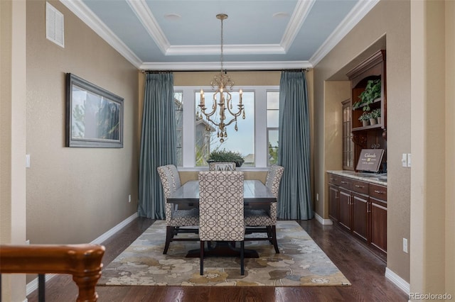 dining space with visible vents, dark wood-style flooring, baseboards, and a chandelier