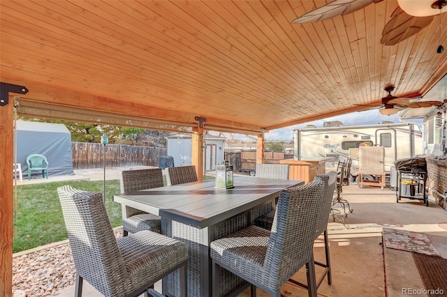 view of patio featuring ceiling fan