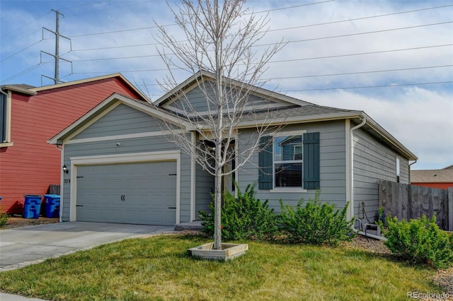 370 Mesa Ave, Brighton, CO 80603 - view of front of property with driveway and a garage