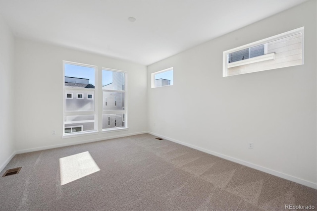 1243 Rhett Dr, Erie, CO 80026 - unfurnished room with carpet flooring, baseboards, and visible vents