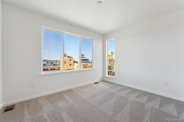 1243 Rhett Dr, Erie, CO 80026 - unfurnished room featuring carpet and baseboards