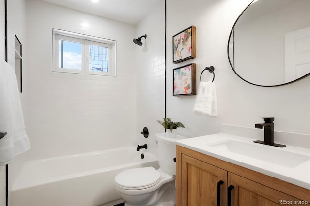 bathroom featuring bathtub / shower combination, toilet, and vanity