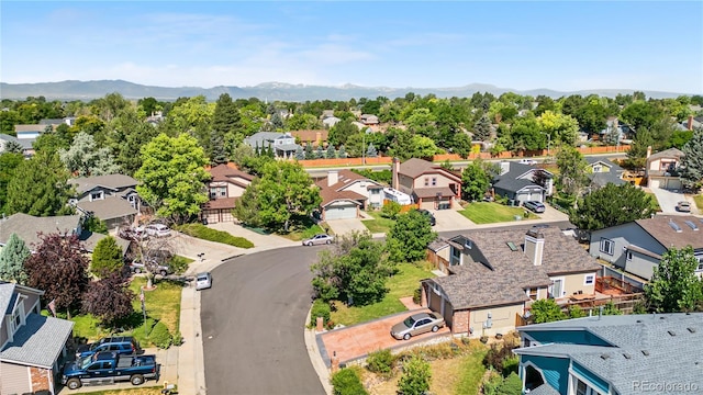 13349 Albion Cir, Thornton, CO 80241 - aerial perspective of suburban area featuring a mountain backdrop