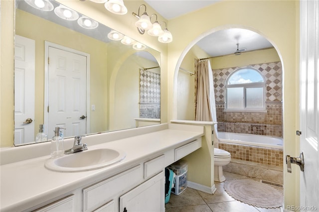 13349 Albion Cir, Thornton, CO 80241 - full bathroom featuring vanity, tile patterned floors, and tiled shower / bath combo