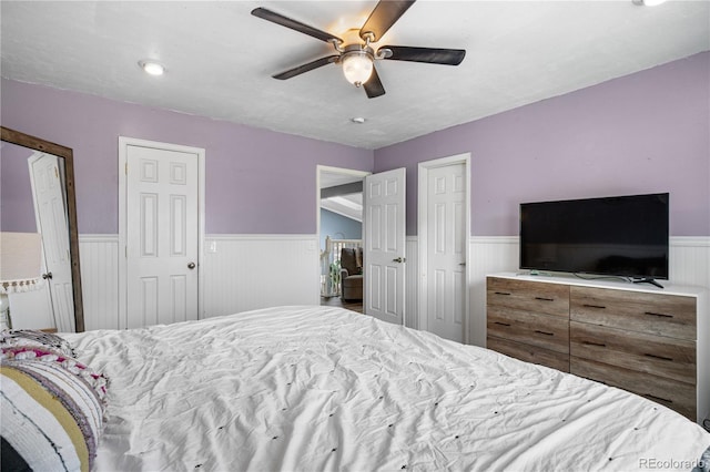 13349 Albion Cir, Thornton, CO 80241 - bedroom featuring a wainscoted wall and ceiling fan