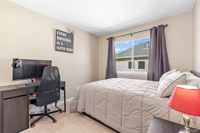 bedroom featuring light colored carpet