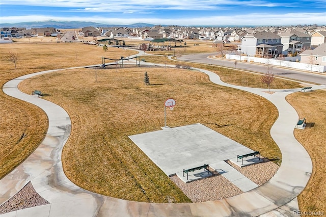 birds eye view of property featuring a mountain view