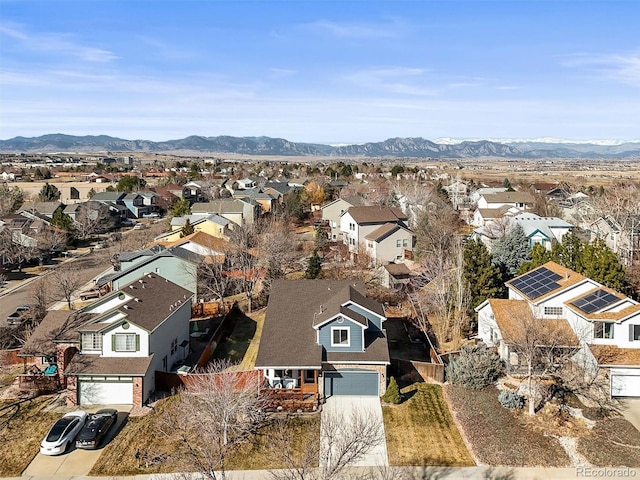 drone / aerial view featuring a mountain view and a residential view