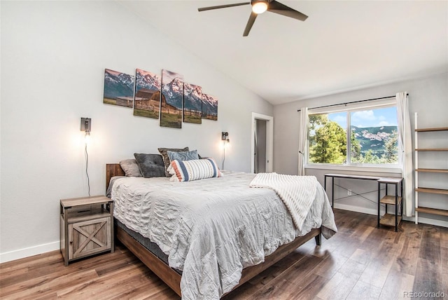 bedroom featuring vaulted ceiling, ceiling fan, and hardwood / wood-style flooring