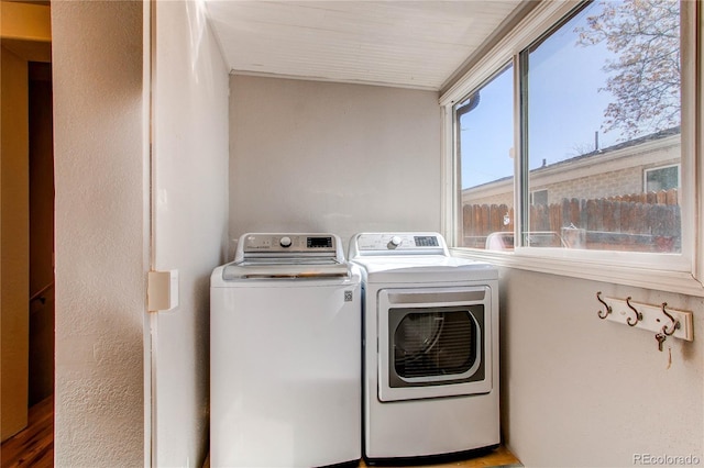 laundry room with laundry area and washing machine and dryer