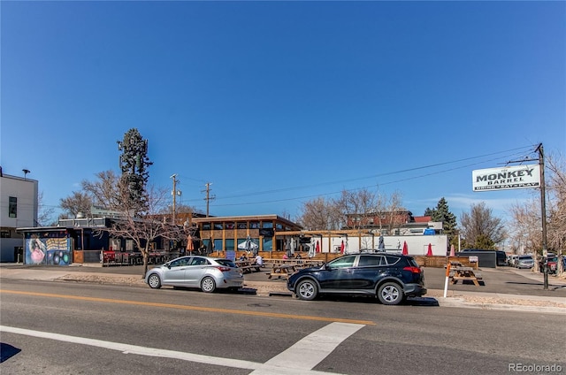 view of road with curbs and sidewalks