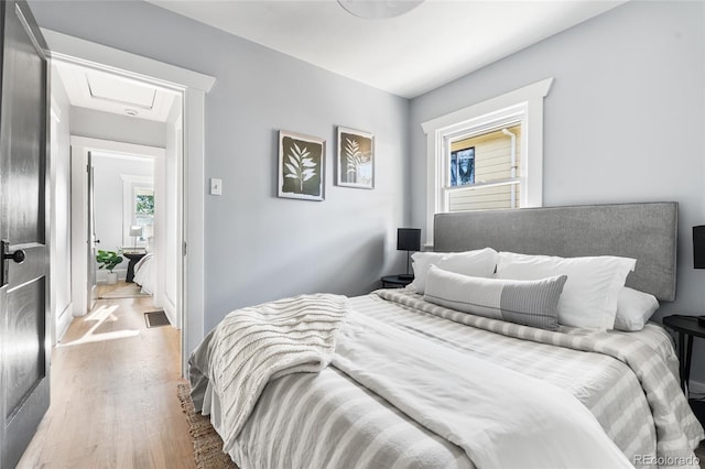 bedroom featuring wood finished floors