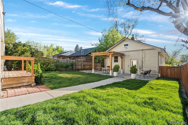 view of front of property featuring a pergola, a patio, and a wooden deck