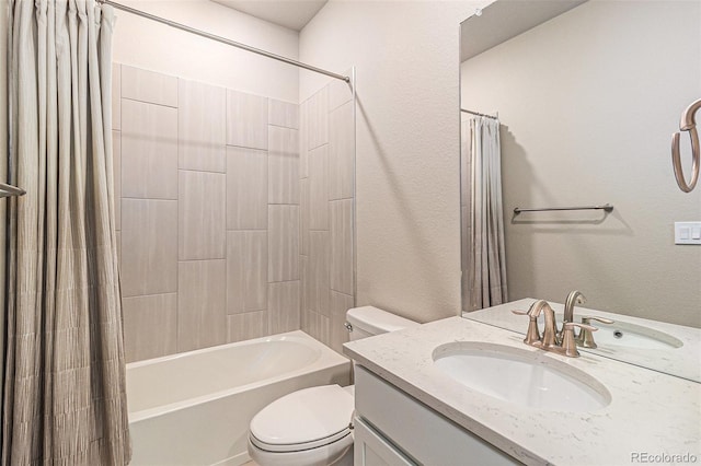 full bathroom featuring toilet, vanity, and shower / bath combo