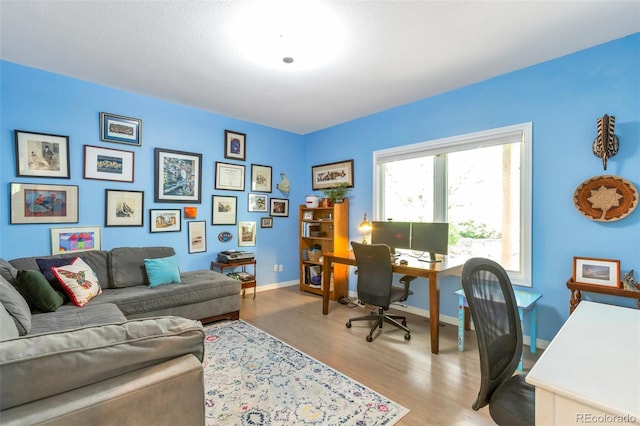 10773 Cougar Rdg, Lone Tree, CO 80124 - office area featuring wood finished floors and baseboards