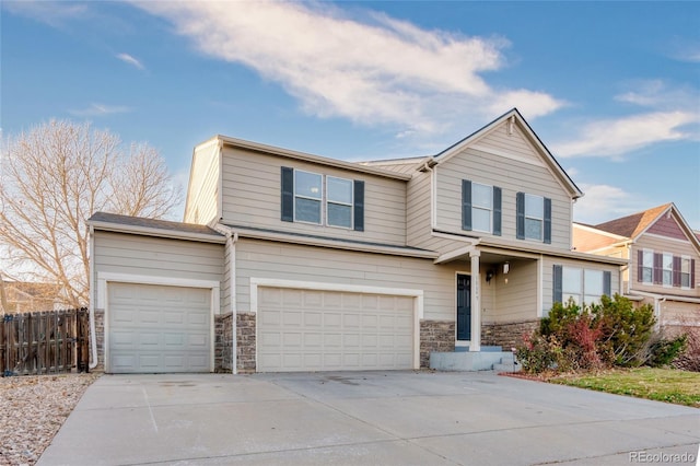 view of front of property with a garage