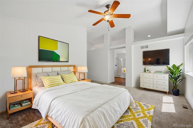 carpeted bedroom featuring vaulted ceiling, ceiling fan, and recessed lighting