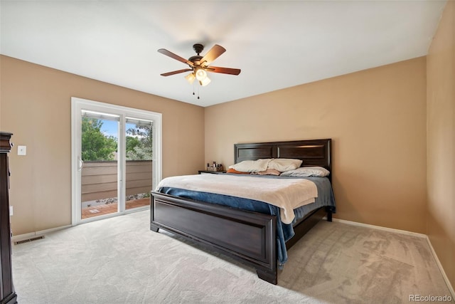 3390 S Ensenada Way, Aurora, CO 80013 - bedroom with access to exterior, carpet floors, and ceiling fan