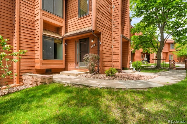 5010 Sunsuite Trl, Colorado Springs, CO 80917 - doorway to property with a yard